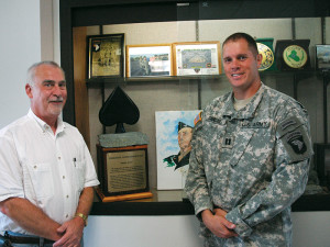 Charlie Foust, Clarksville Foundry President, Left, with Capt. Edwin Churchill with the Currahee Commander’s Cup Trophy