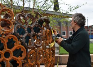 Sculptor Vaughn Randall and his assistant, Erin Schiano, came to Clarksville in April to assemble the cast iron sculpture at Downtown Commons.