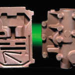Gray iron hydraulic valve body. A front and back view are shown.